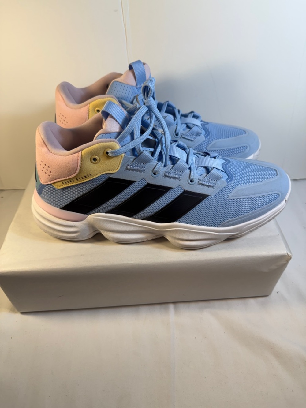 adidas Light Blue Mesh Sneakers with Black Stripes and Pastel Accents